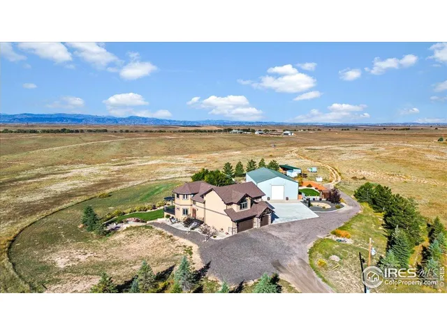 a view of an ocean and a mountain