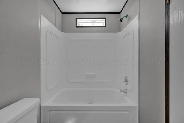 a close up of a bathtub curtain