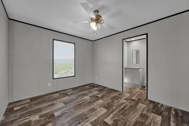 a view of a livingroom with a workspace