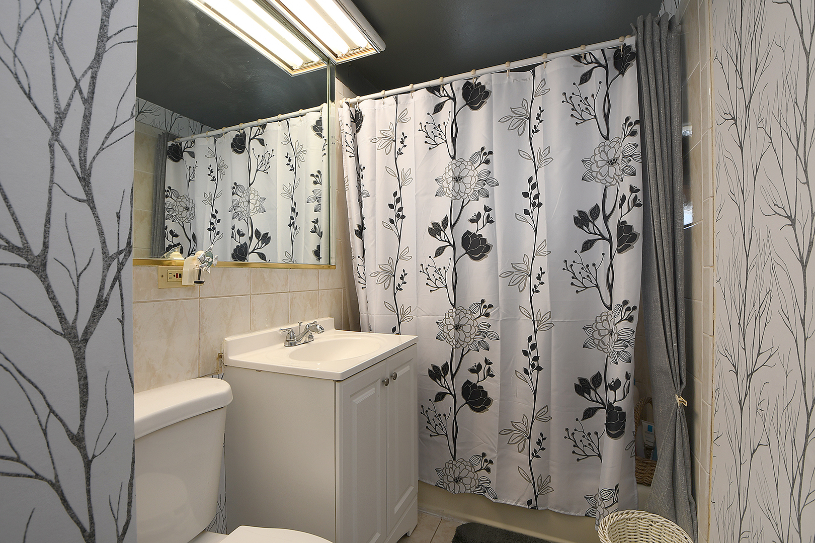 1143 Ridge Road Homewood, IL 60430 - Photo 17 of 26 a bathroom with a sink toilet and shower