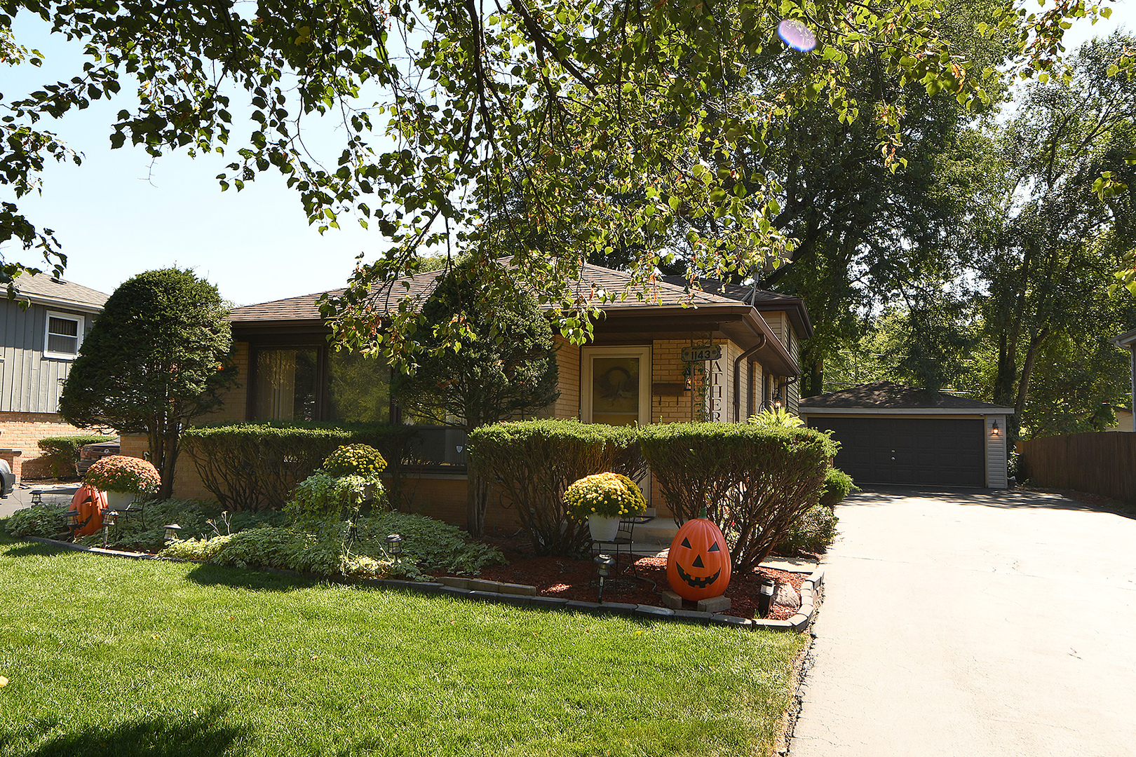 1143 Ridge Road Homewood, IL 60430 - Photo 3 of 26 a front view of a house with a yard