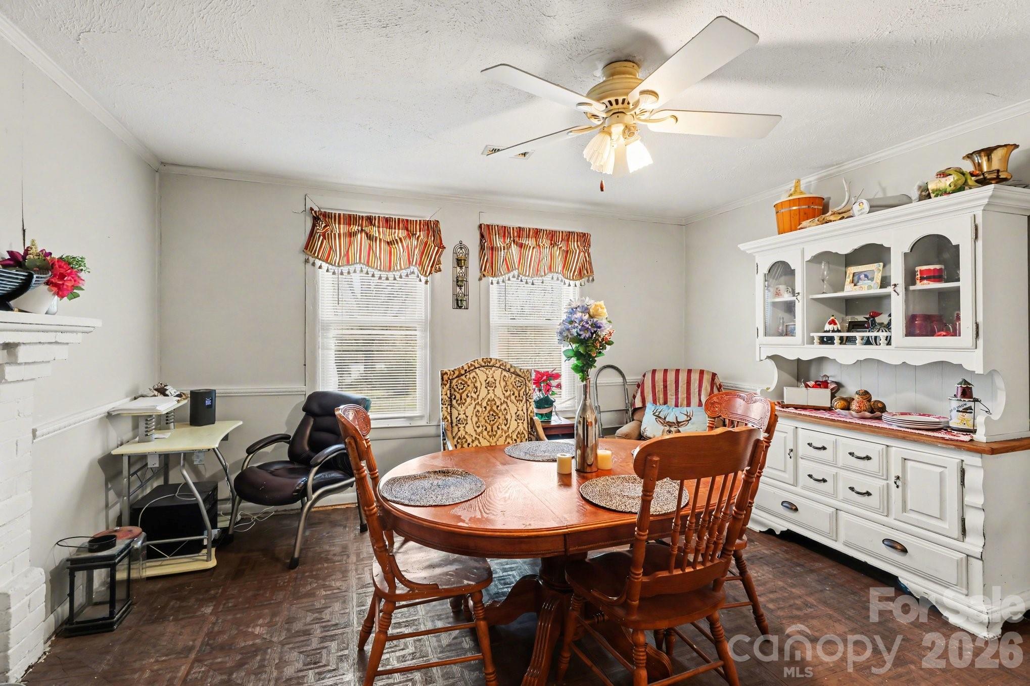 13721 Highway 601 Midland, NC 28107 - Photo 11 of 24 a view of a dining room with furniture and chandelier