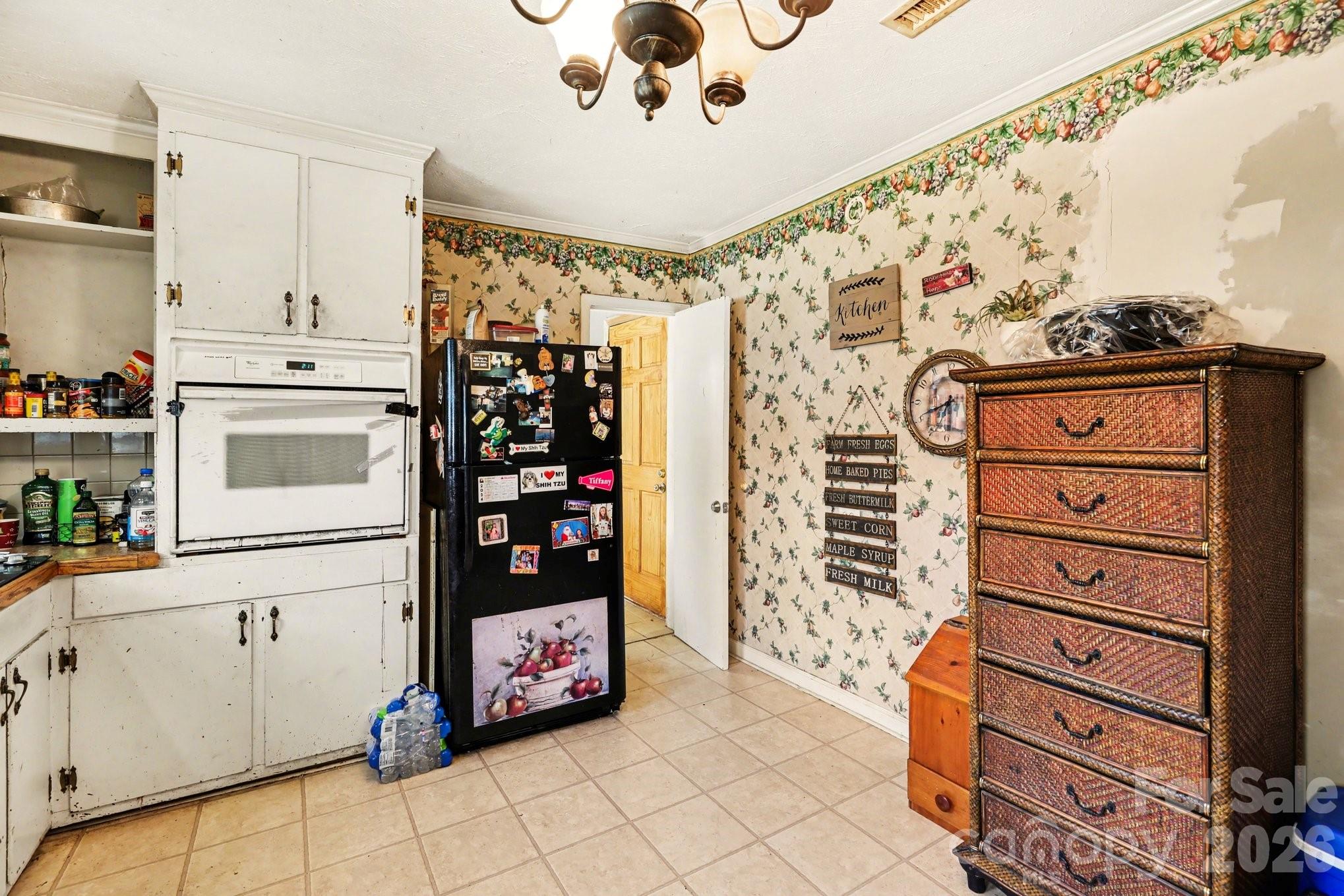 13721 Highway 601 Midland, NC 28107 - Photo 14 of 24 a kitchen with a cabinets and window