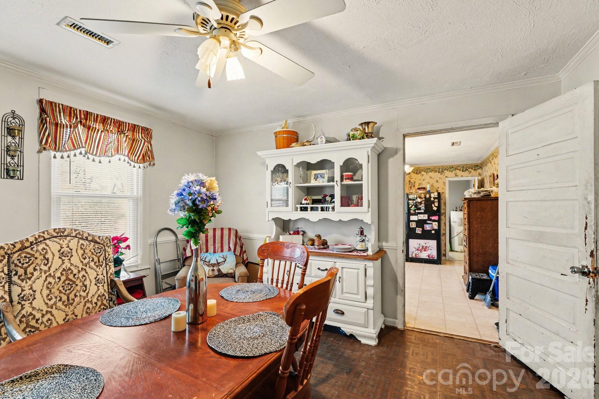 13721 Highway 601 Midland, NC 28107 - Photo 15 of 24 a dining room with furniture and wooden floor