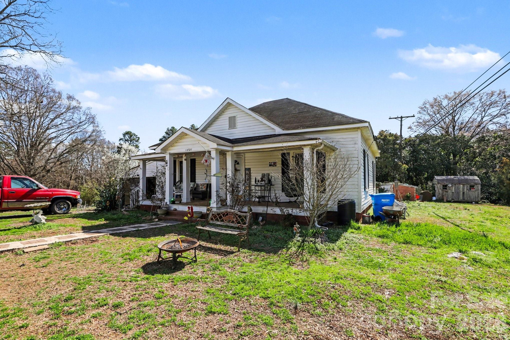 13721 Highway 601 Midland, NC 28107 - Photo 2 of 24 a view of a house with swimming pool and sitting area
