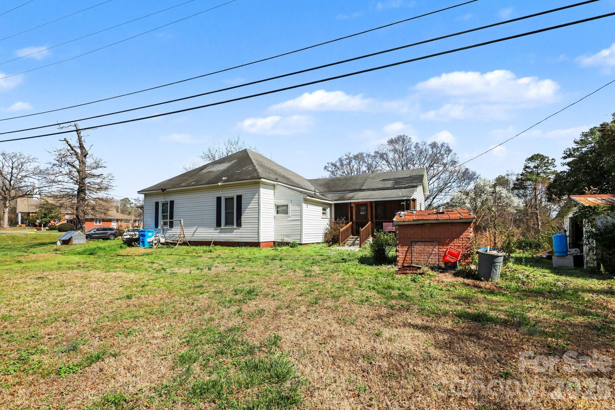 13721 Highway 601 Midland, NC 28107 - Photo 5 of 24 a view of a house with a yard