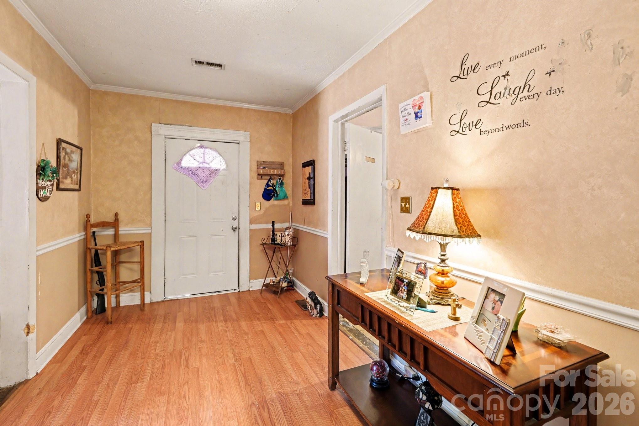 13721 Highway 601 Midland, NC 28107 - Photo 9 of 24 a view of a workspace with furniture and wooden floor