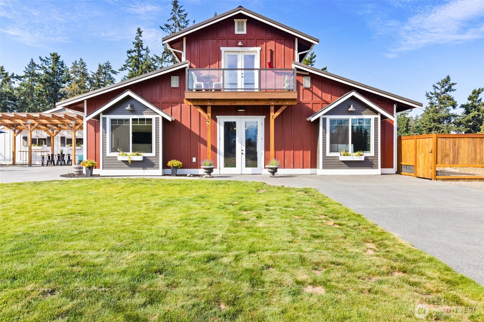 135 Edgington Drive Sequim, WA 98382 - Photo 1 of 40 a front view of a house with a yard