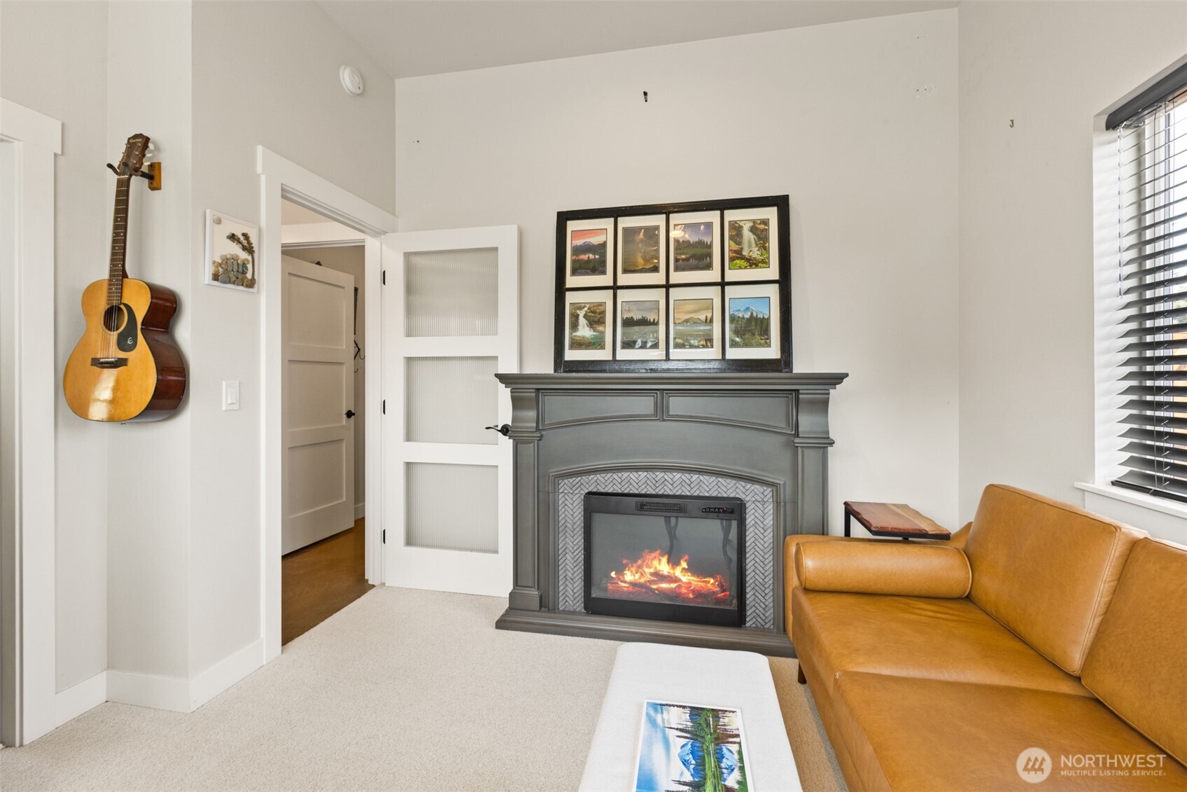 135 Edgington Drive Sequim, WA 98382 - Photo 20 of 40 a living room with furniture and a fireplace