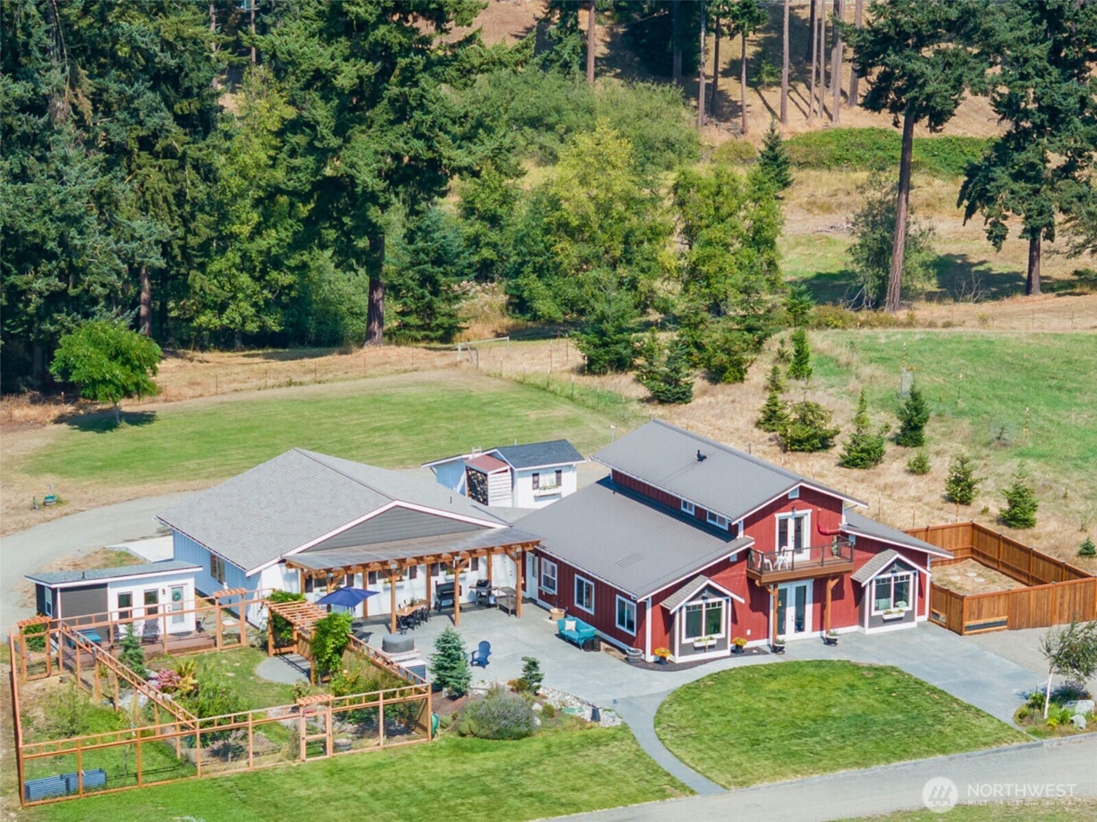 135 Edgington Drive Sequim, WA 98382 - Photo 2 of 40 an aerial view of a house