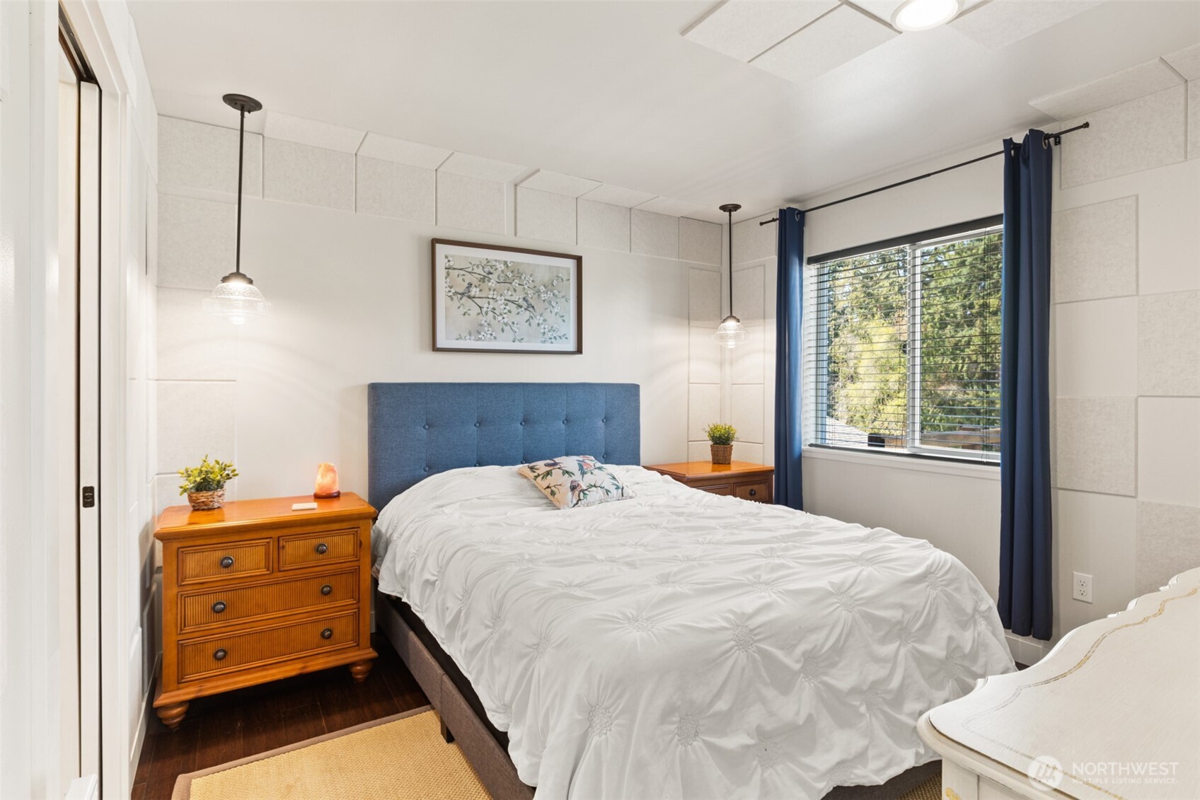 135 Edgington Drive Sequim, WA 98382 - Photo 36 of 40 a bedroom with a bed and a window