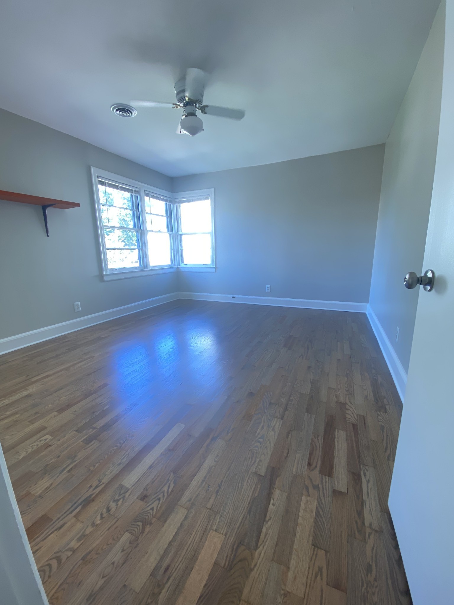 103 Lauderdale Road, Unit B Nashville, TN 37205 - Photo 15 of 17 wooden floor in an empty room with a window