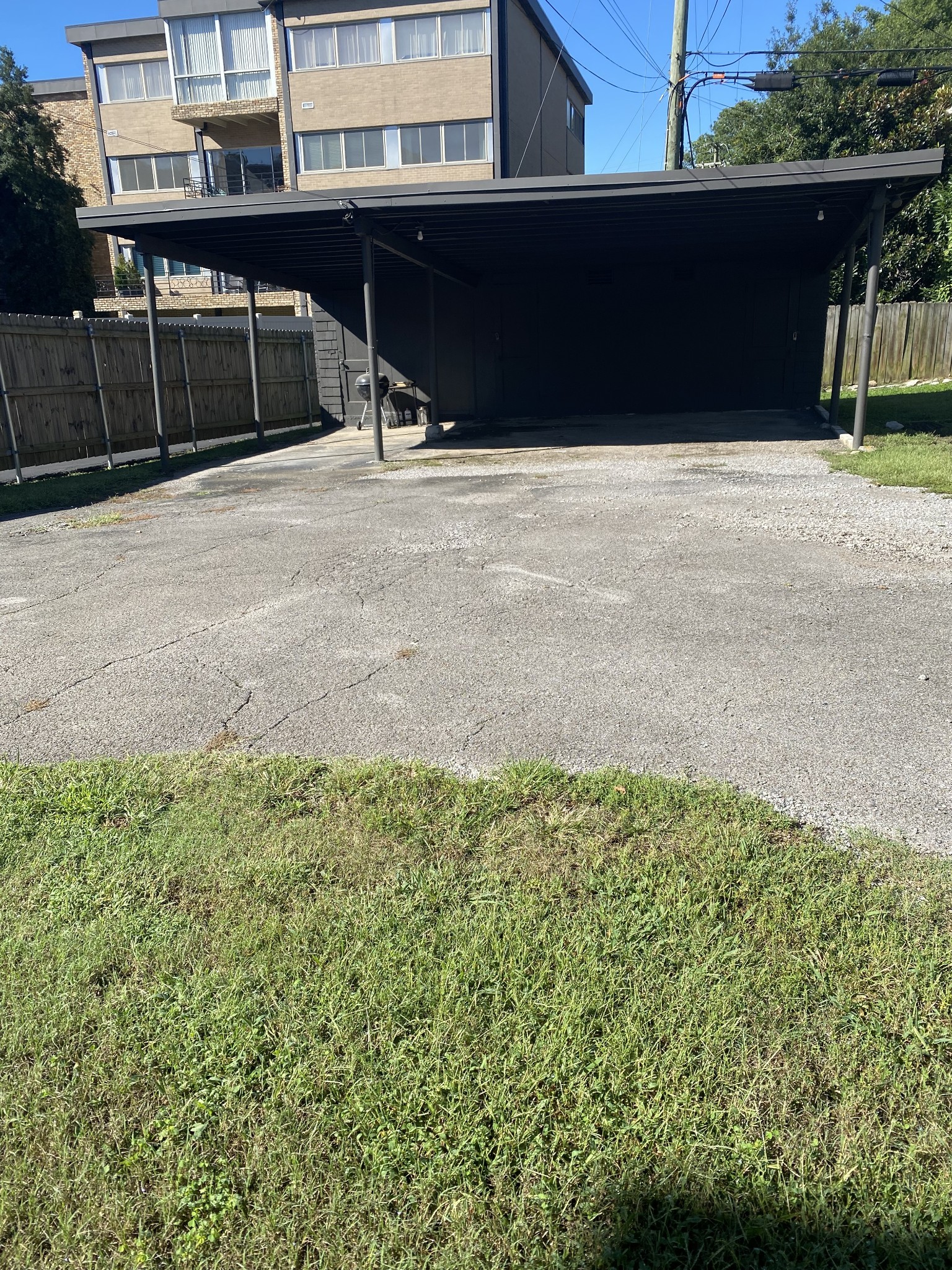 103 Lauderdale Road, Unit B Nashville, TN 37205 - Photo 17 of 17 a black car parked in front of a building