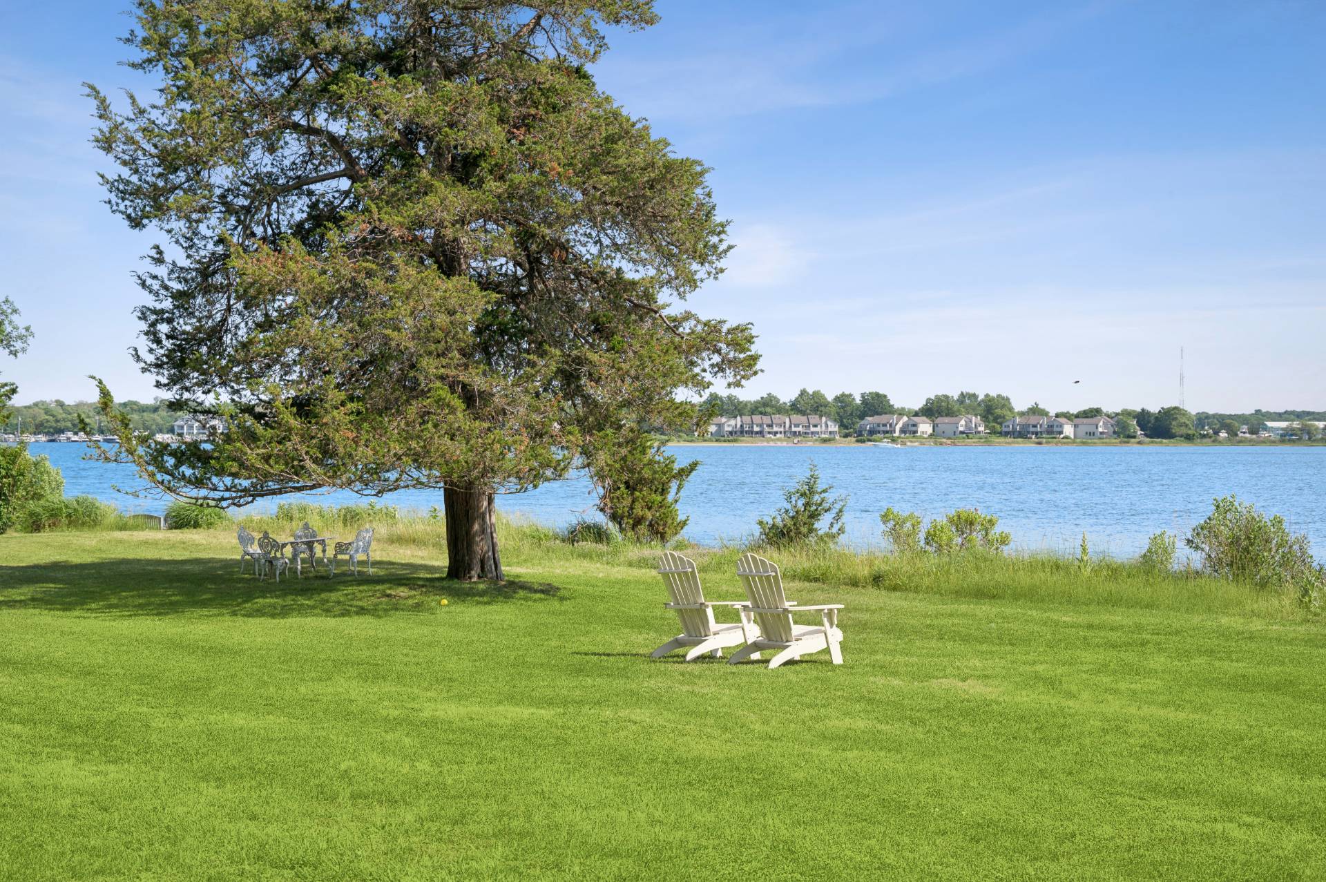 69 Ferry Road Sag Harbor, NY 11963 - Photo 7 of 17 a garden with wooden fence