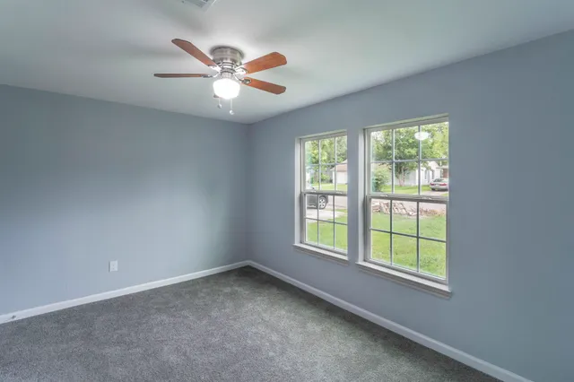 a view of a backyard with a garden