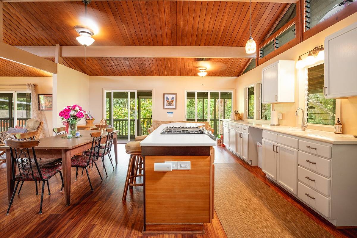 2060 Puukaa Street Kapaa, HI 96746 - Photo 5 of 19 a kitchen with stainless steel appliances granite countertop a stove and cabinets