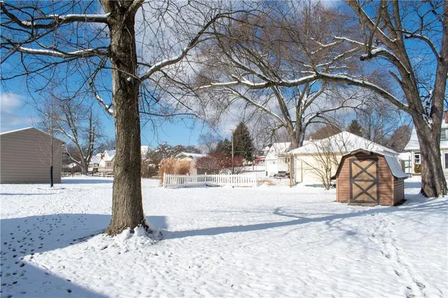 a view of a backyard of the house