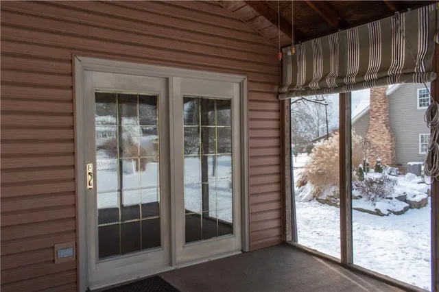 a view of a porch with a door