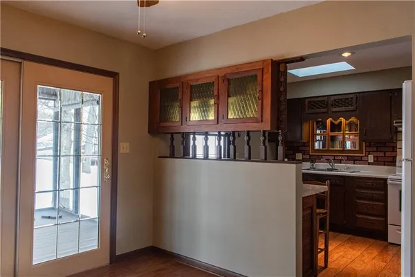 a kitchen with stainless steel appliances granite countertop a stove and a refrigerator