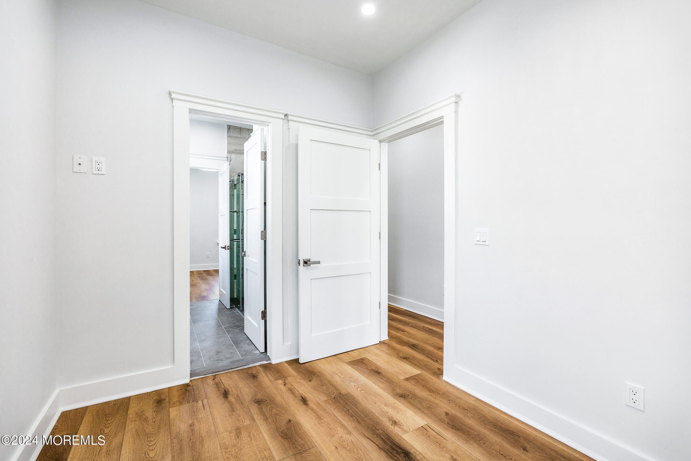 10 Via Ripa Way, Unit 2 Sea Bright, NJ 07760 - Photo 18 of 44 a view of a room with wooden floor