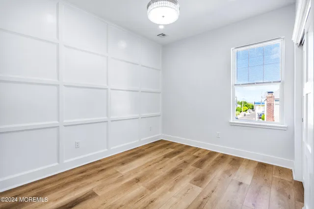 a view of an empty room and window