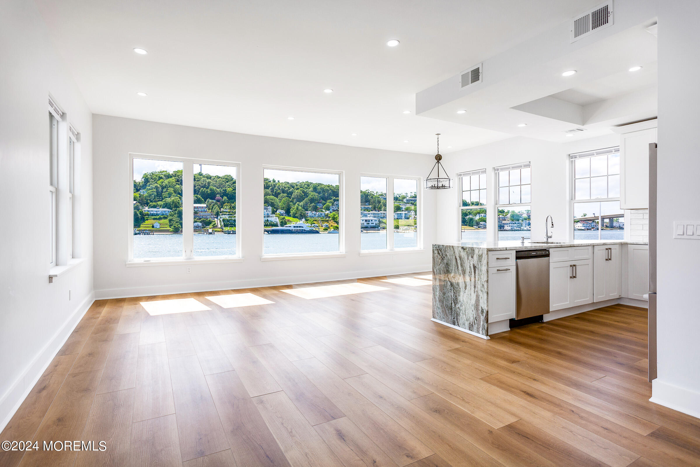 10 Via Ripa Way, Unit 2 Sea Bright, NJ 07760 - Photo 5 of 44 a room with stainless steel appliances wooden floors and view living room