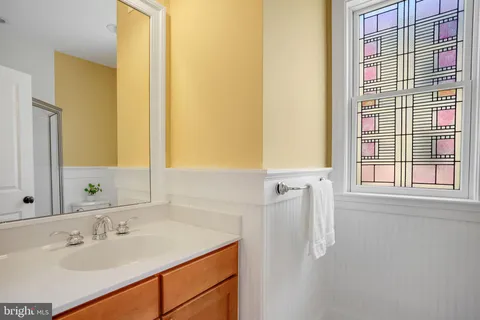 a kitchen with lots of counter top space and cabinets