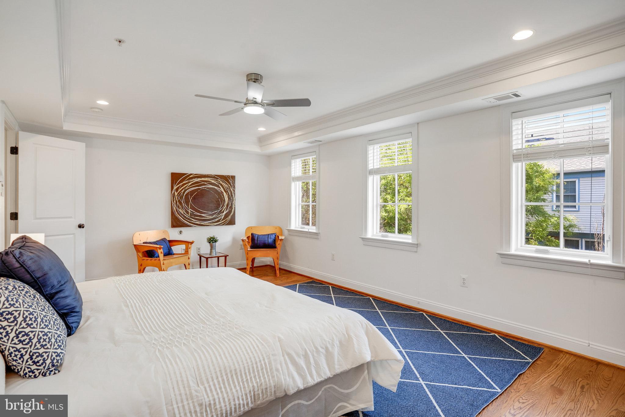 8920 Courts Way Silver Spring, MD 20910 - Photo 27 of 52 a bed room with a bed mirror and a window