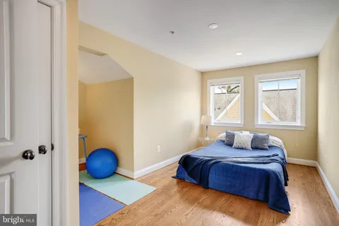 a view of livingroom with hardwood floor and hallway