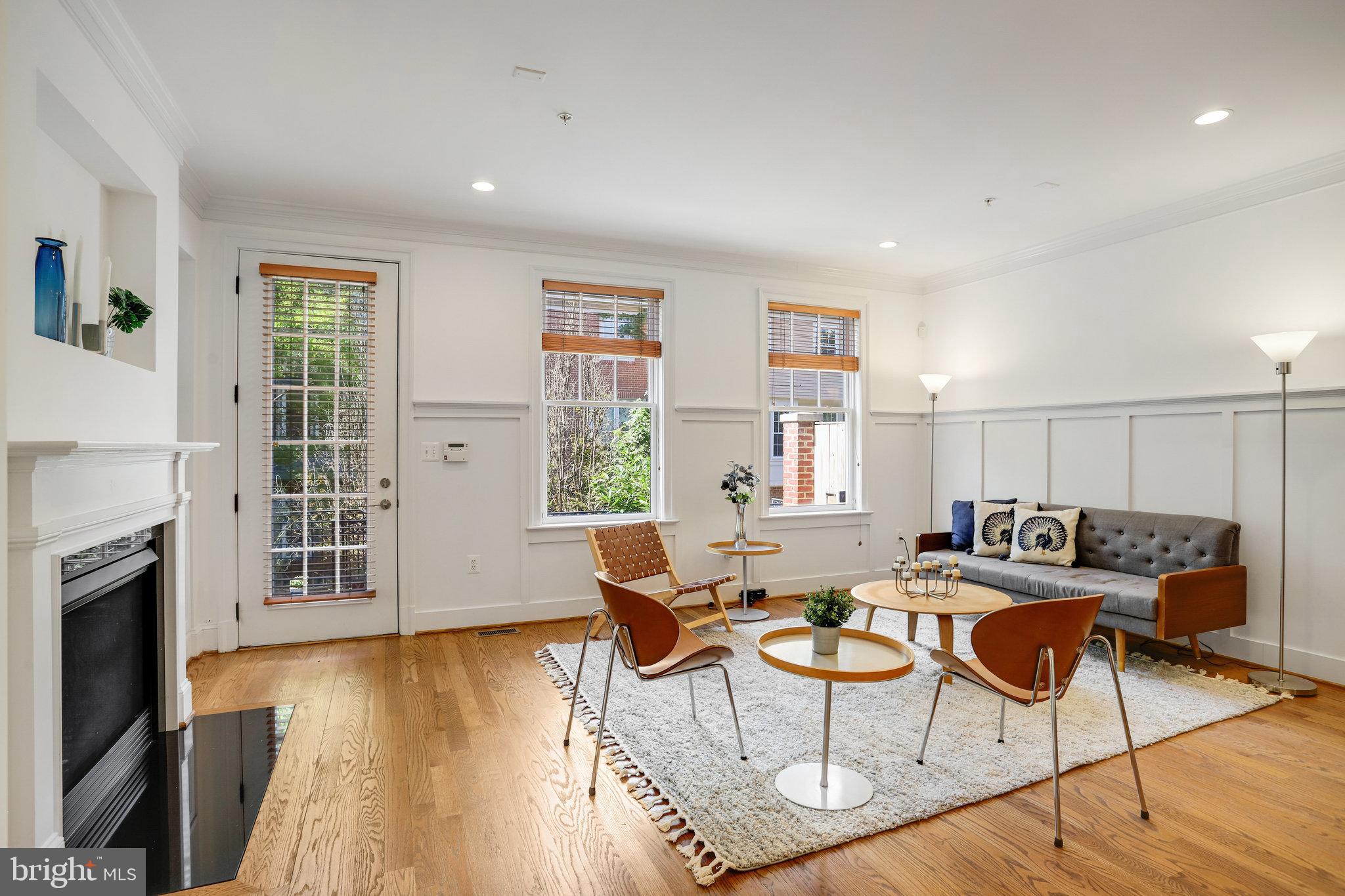 8920 Courts Way Silver Spring, MD 20910 - Photo 8 of 52 a living room with furniture and a fireplace