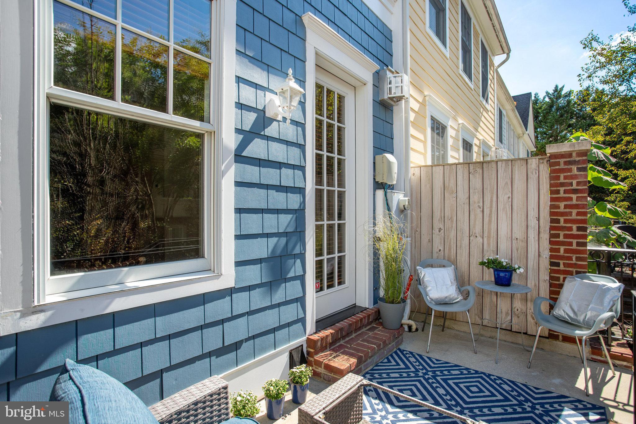 8920 Courts Way Silver Spring, MD 20910 - Photo 9 of 52 a view of a chair and bench in the porch
