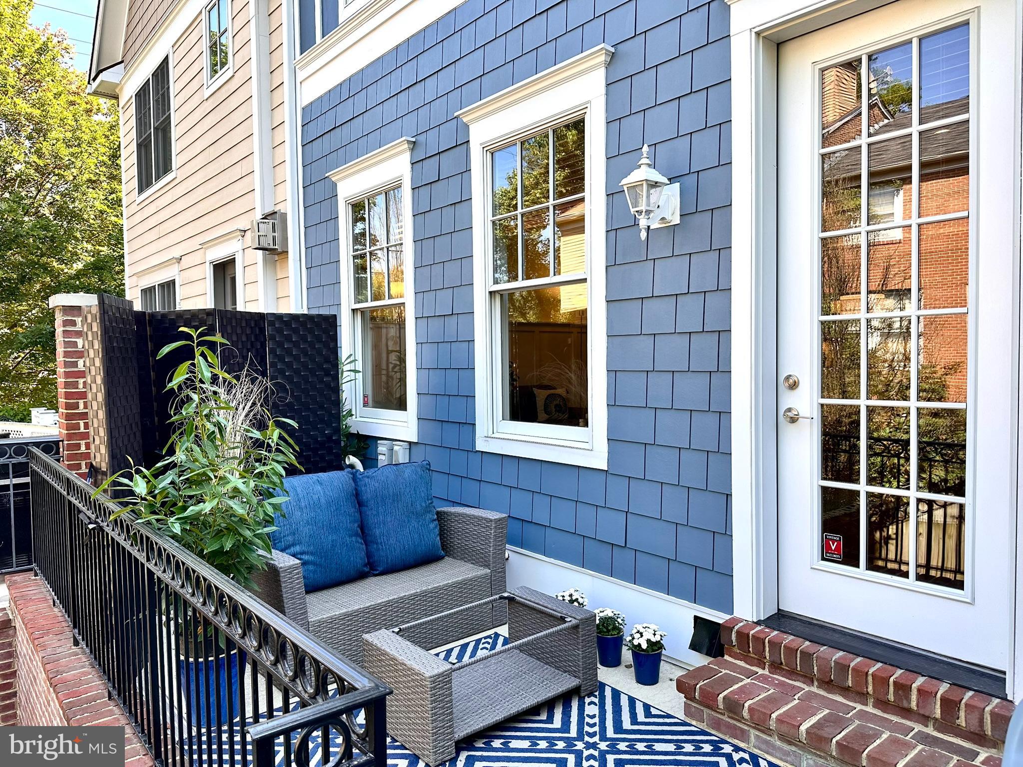 8920 Courts Way Silver Spring, MD 20910 - Photo 10 of 52 a view of two chairs and a potted plant