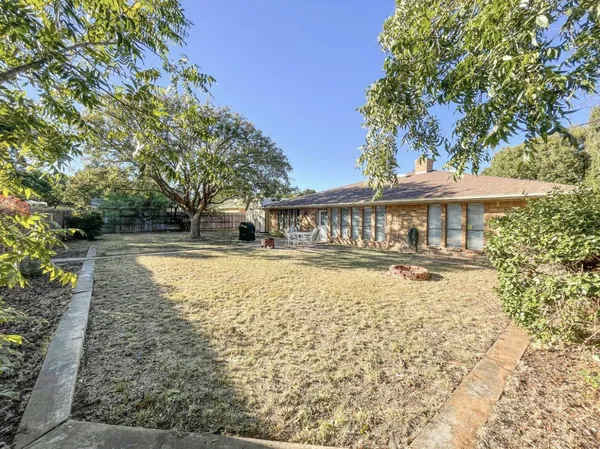 a view of house with outdoor space