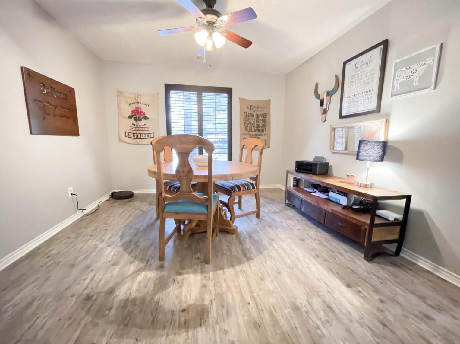 5413 83rd Street Lubbock, TX 79424 - Photo 8 of 21 a living room with furniture and wooden floor