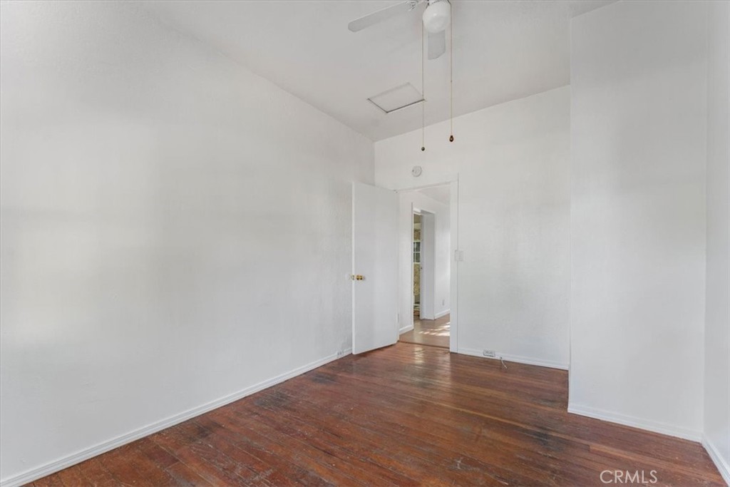 818 6th Street Corning, CA 96021 - Photo 18 of 36 a view of an empty room with wooden floor