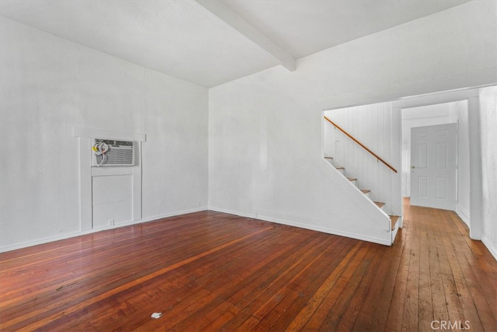818 6th Street Corning, CA 96021 - Photo 2 of 36 a view of empty room with wooden floor