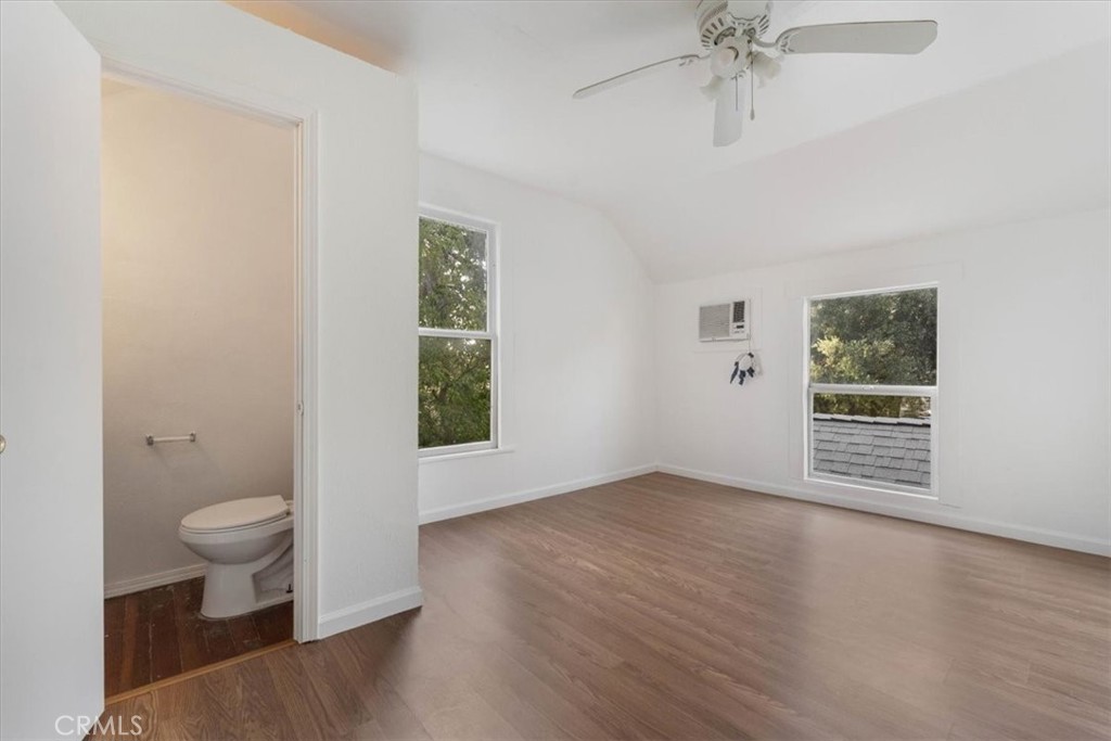 818 6th Street Corning, CA 96021 - Photo 21 of 36 wooden floor in an empty room with a window