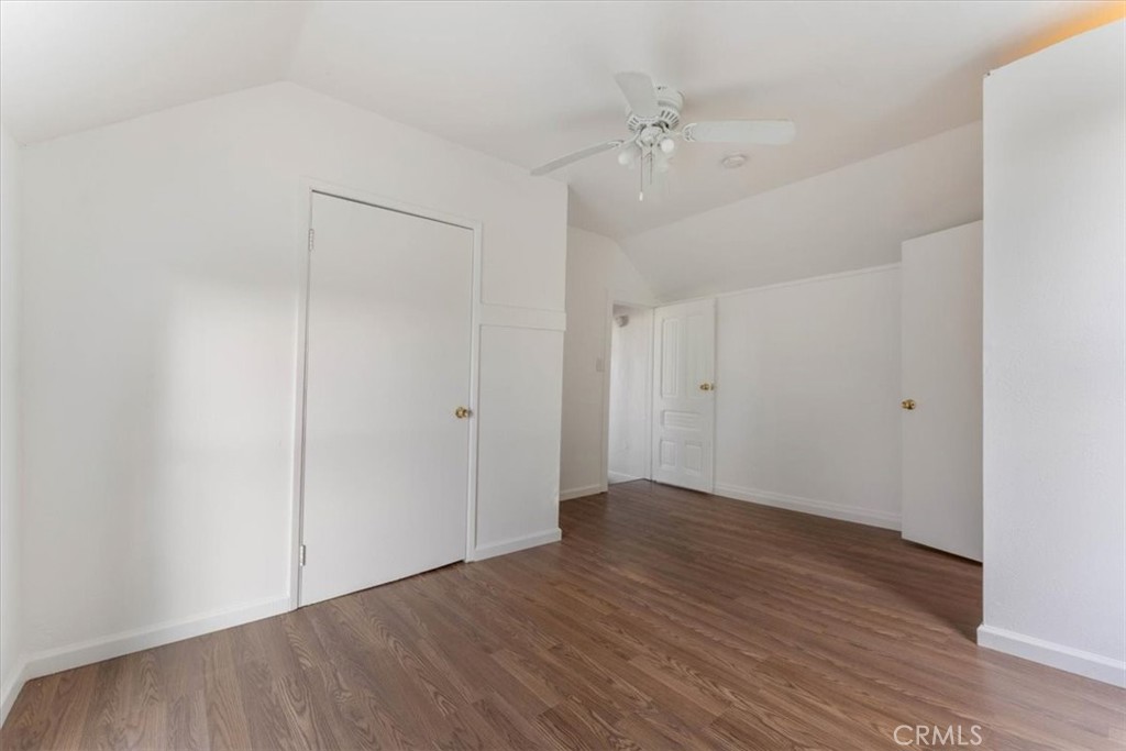 818 6th Street Corning, CA 96021 - Photo 22 of 36 a view of an empty room with wooden floor