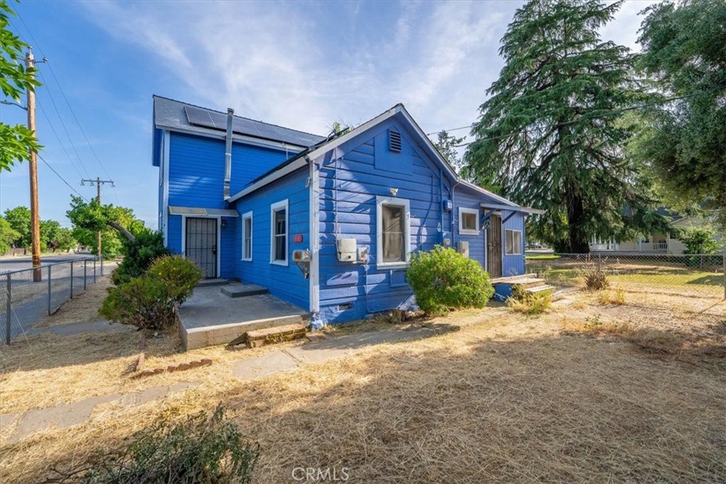 818 6th Street Corning, CA 96021 - Photo 26 of 36 a view of a house with backyard and sitting area