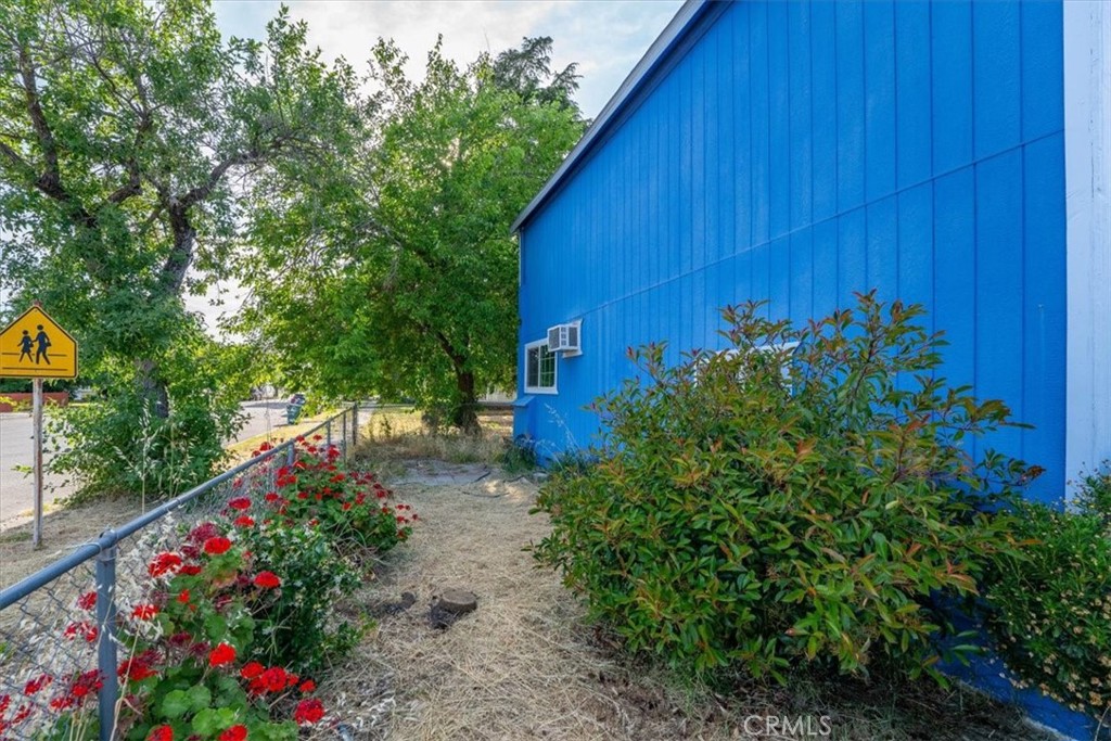818 6th Street Corning, CA 96021 - Photo 30 of 36 a backyard of a house with lots of green space