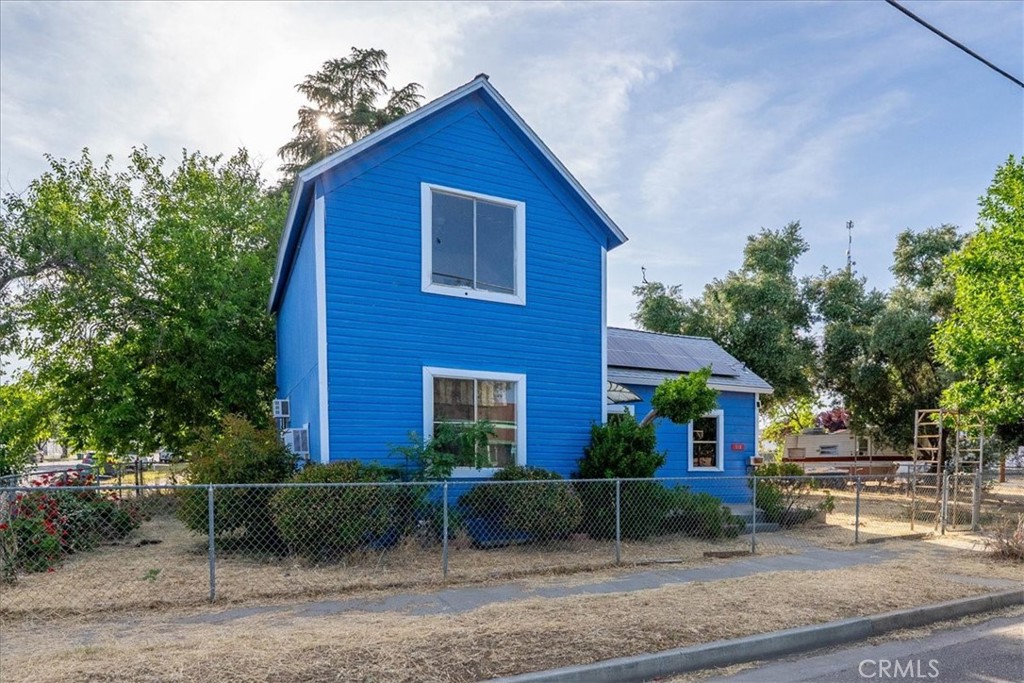 818 6th Street Corning, CA 96021 - Photo 35 of 36 a view of a house with a yard and plants