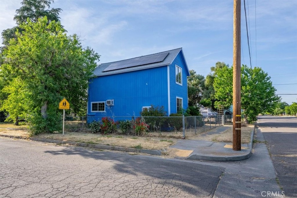 818 6th Street Corning, CA 96021 - Photo 36 of 36 a front view of a house with garden