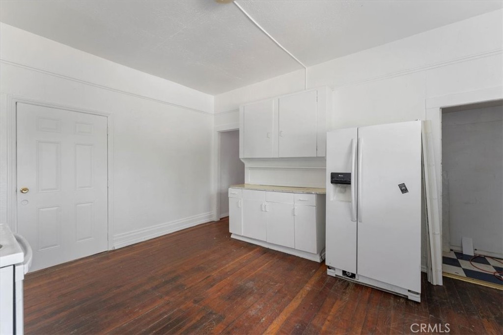 818 6th Street Corning, CA 96021 - Photo 7 of 36 a view of a kitchen with wooden floor
