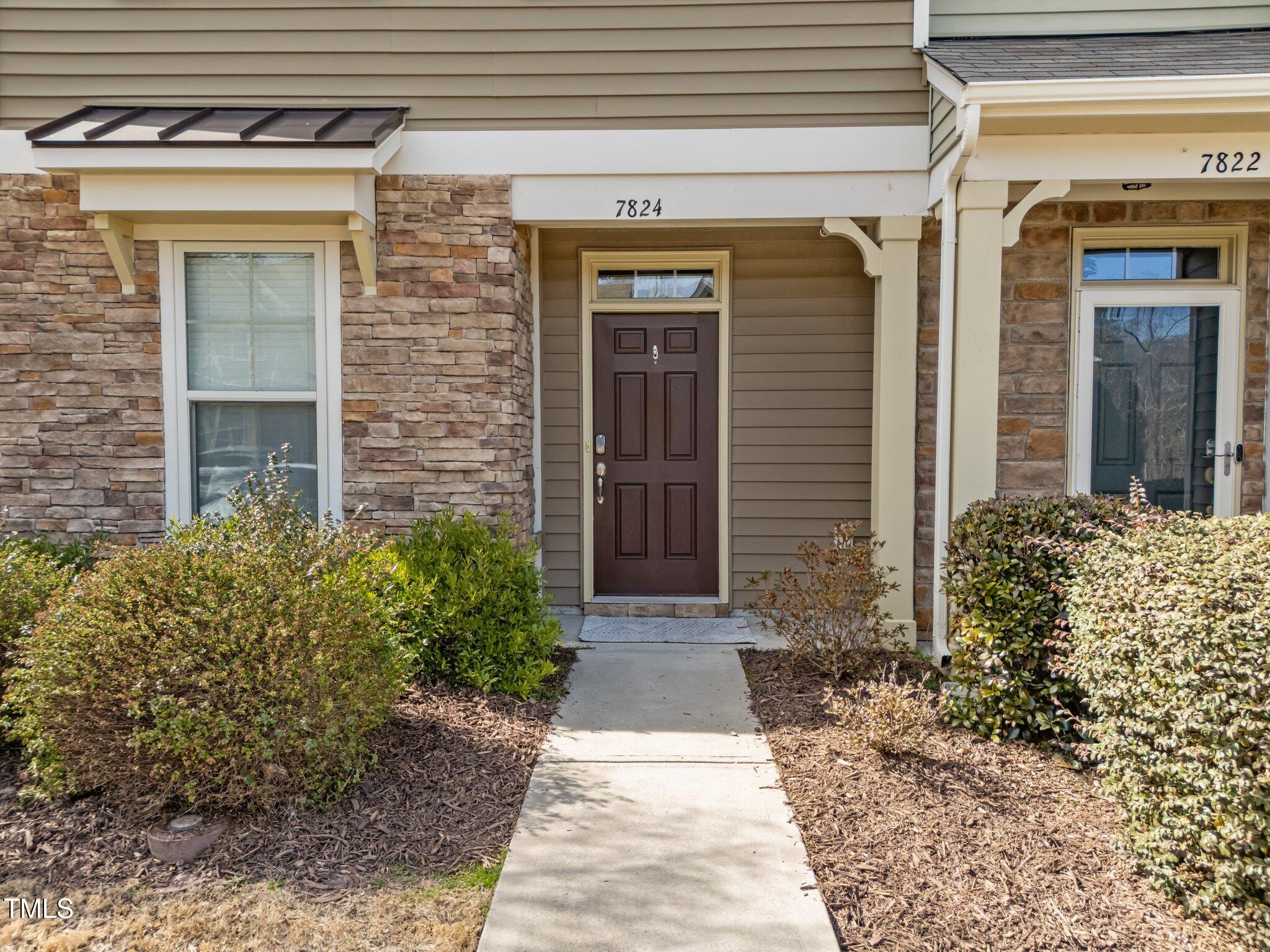 7824 Allscott Way Raleigh, NC 27612 - Photo 3 of 26 a front view of a house