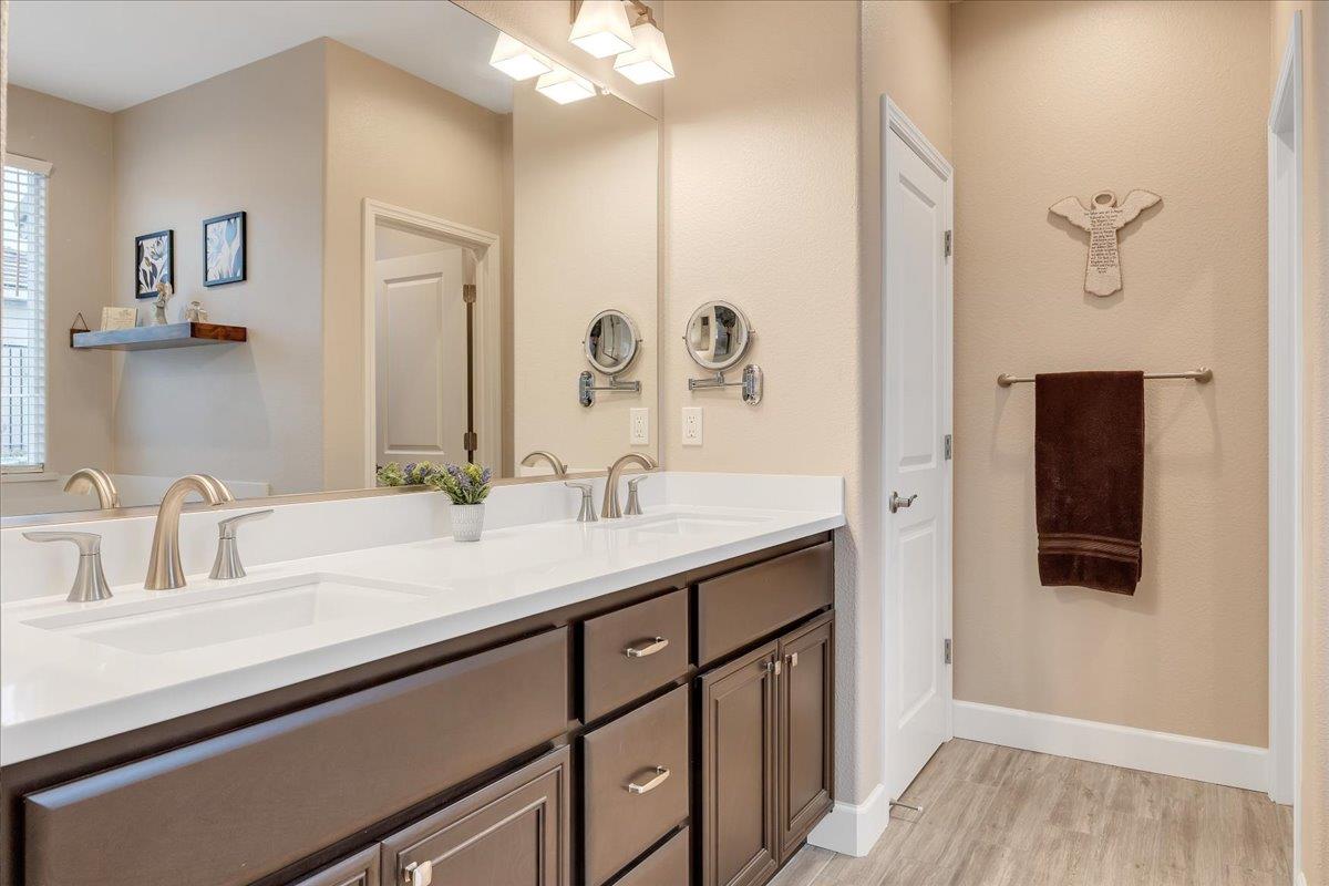 133 Palisades Place Copperopolis, CA 95228 - Photo 62 of 95 a bathroom with a sink and a mirror