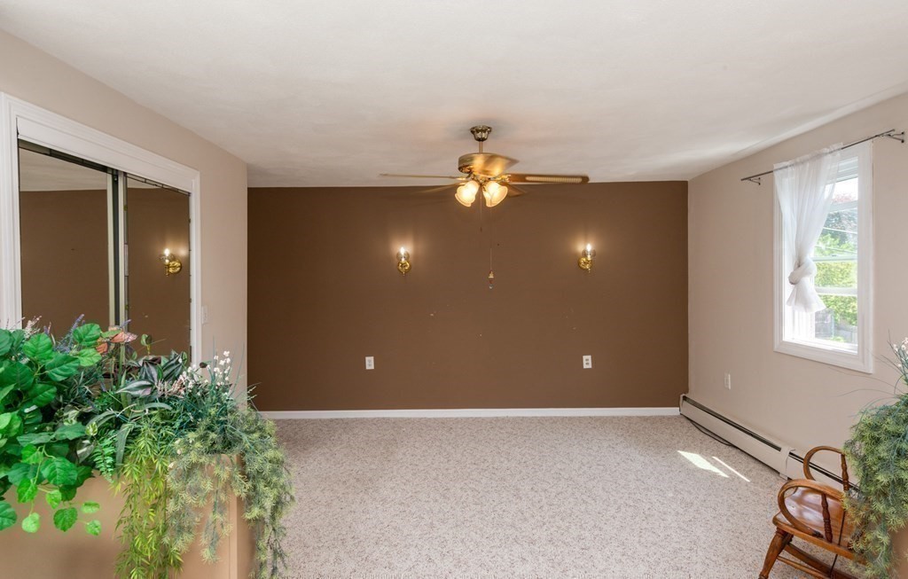 46 Holten Street Peabody, MA 01960 - Photo 18 of 41 a view of an empty room with a window