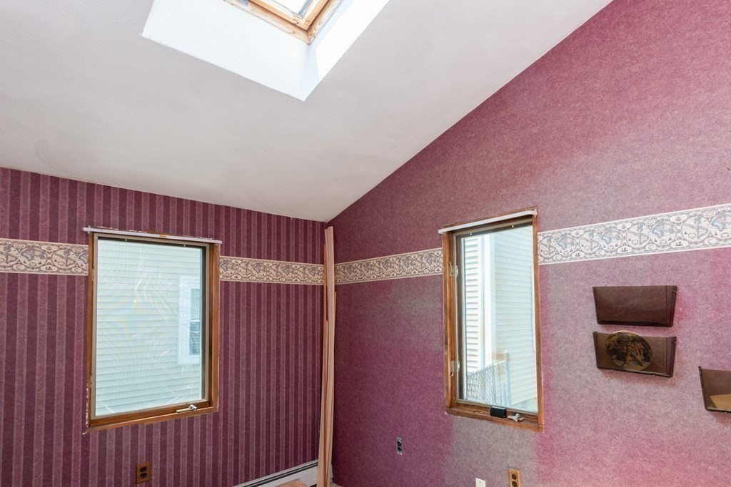46 Holten Street Peabody, MA 01960 - Photo 21 of 41 a view of livingroom with furniture and a window