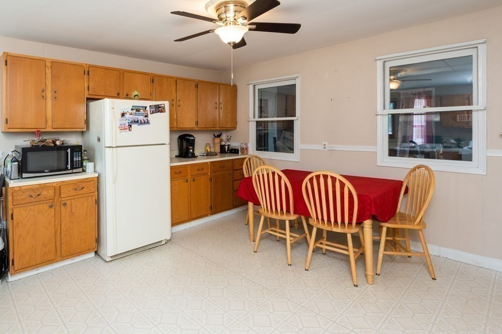 46 Holten Street Peabody, MA 01960 - Photo 28 of 41 a view of a dining room with furniture window and outside view