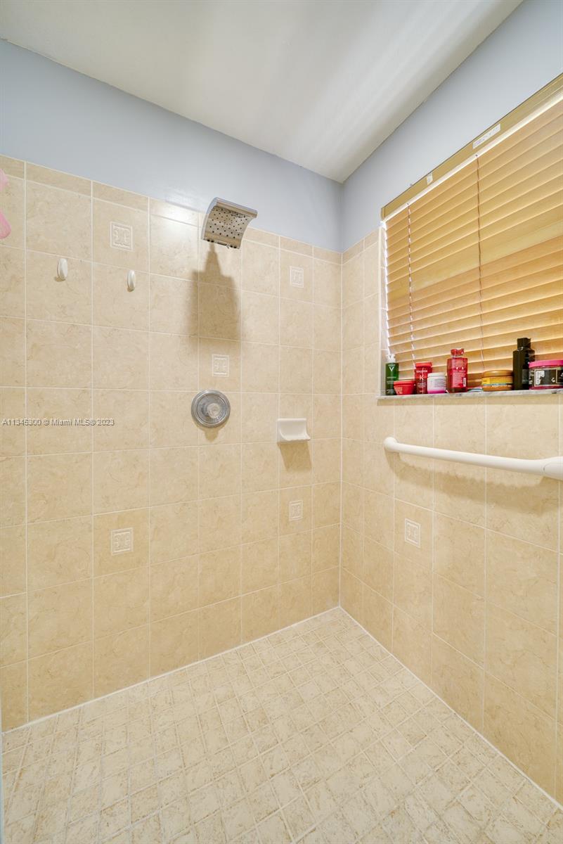 1635 Southeast 20th Place Homestead, FL 33035 - Photo 15 of 28 a bathroom with a shower