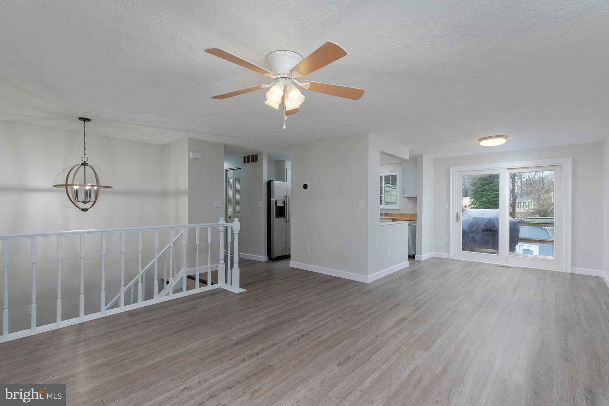 308 Raussell Place Severna Park, MD 21146 - Photo 7 of 39 Living Room to Dining Area and Kitchen